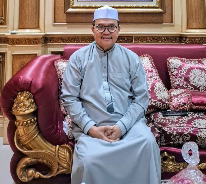 
					Rusli Zainal