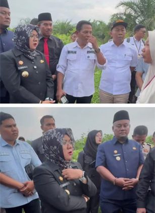 Bupati Siak, Afni Zulkifli, dan Wakil Bupati Siak, Syamsurizal Budi, bersama rombongan ketika berdialog dengan warga Merempan Hulu.