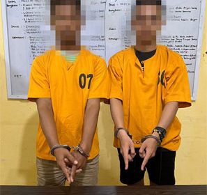 Dua Pria Yang Diamankan Polisi 