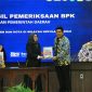 Roby Kurniawan, Bupati Bintan menerima hasil laporan BPK Provinsi atas WTP atas Laporan Keuangan Pemerintah Daerah . (Foto: ist)