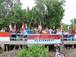 Peresmian Jembatan Merah Putih Presisi Tahap II di Jalan Nelayan, Dusun I, Desa Mayang Sari, Kecamatan Merbau. (Foto: ist)