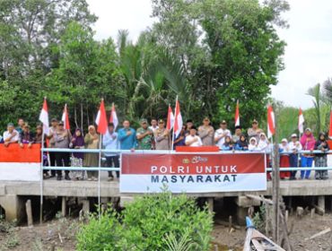 Peresmian Jembatan Merah Putih Presisi Tahap II di Jalan Nelayan, Dusun I, Desa Mayang Sari, Kecamatan Merbau. (Foto: ist)