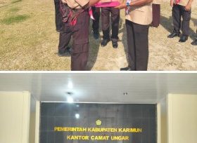 Sekcam Ungar Zamri, di dampingi Ka Kwarran Ungar M Nasrol serahkan surat tugas dan foto bersama. (Foto: Raja Juraimi)