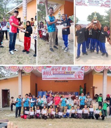 Ketua PGRI Ungar, Sekcam Ungar, Seklur, KA SMAN 1 Ungar, KA SDN se Ungar, panitia gerak jalan fhoto bersama para pemenang. Foto: Raja Juraimi)