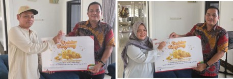 Jepri  dan Tessy penerima hadiah program Bedelau Langsung BRK Syariah. (Foto: ist)